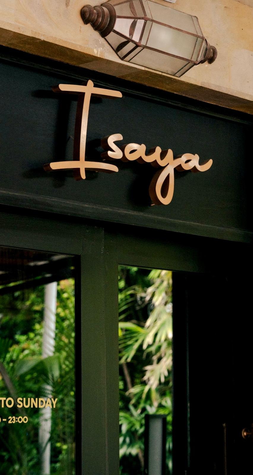 Isaya entrance sign with lantern